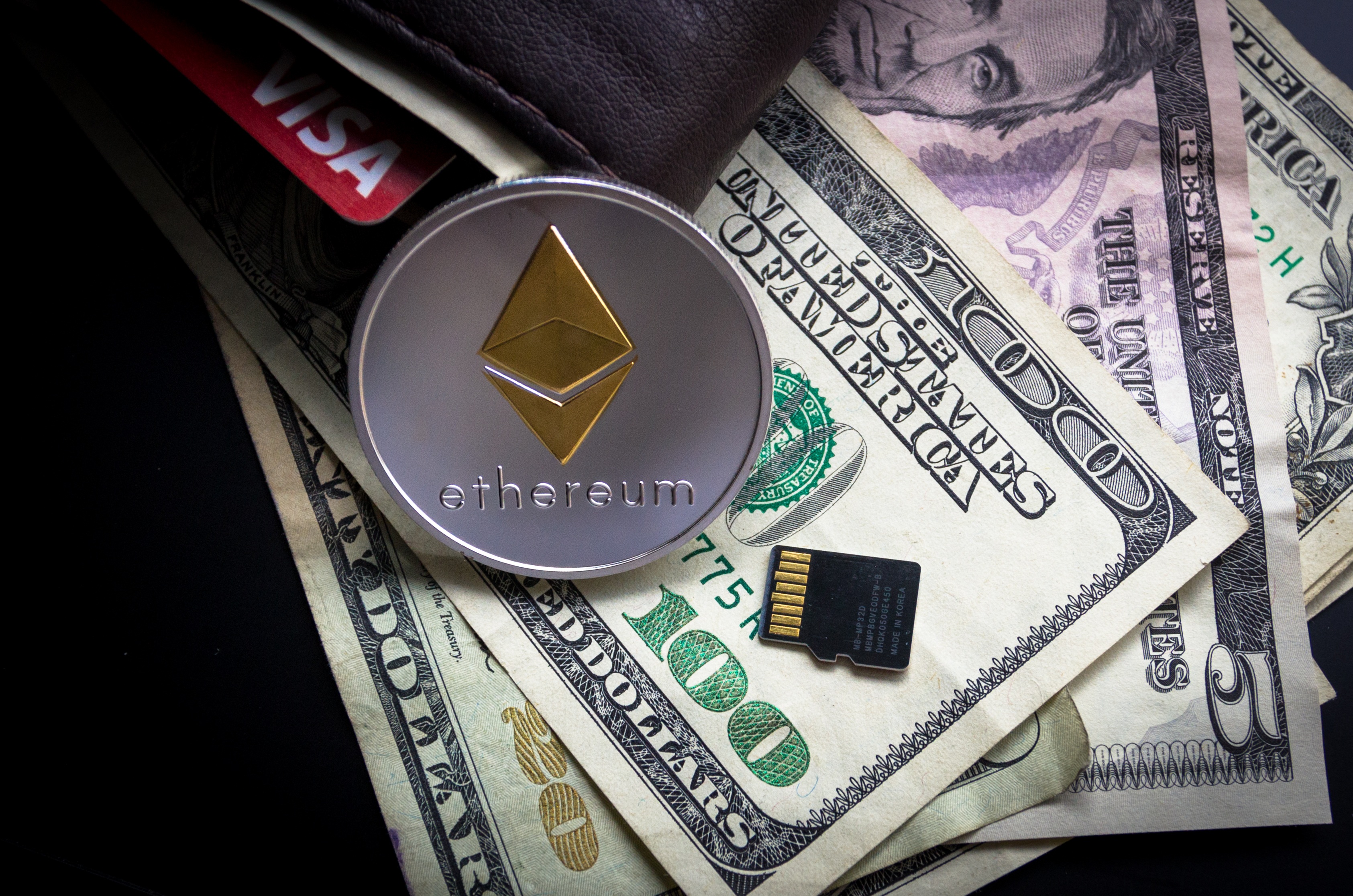 Ethereum Wallet and Dollar bills