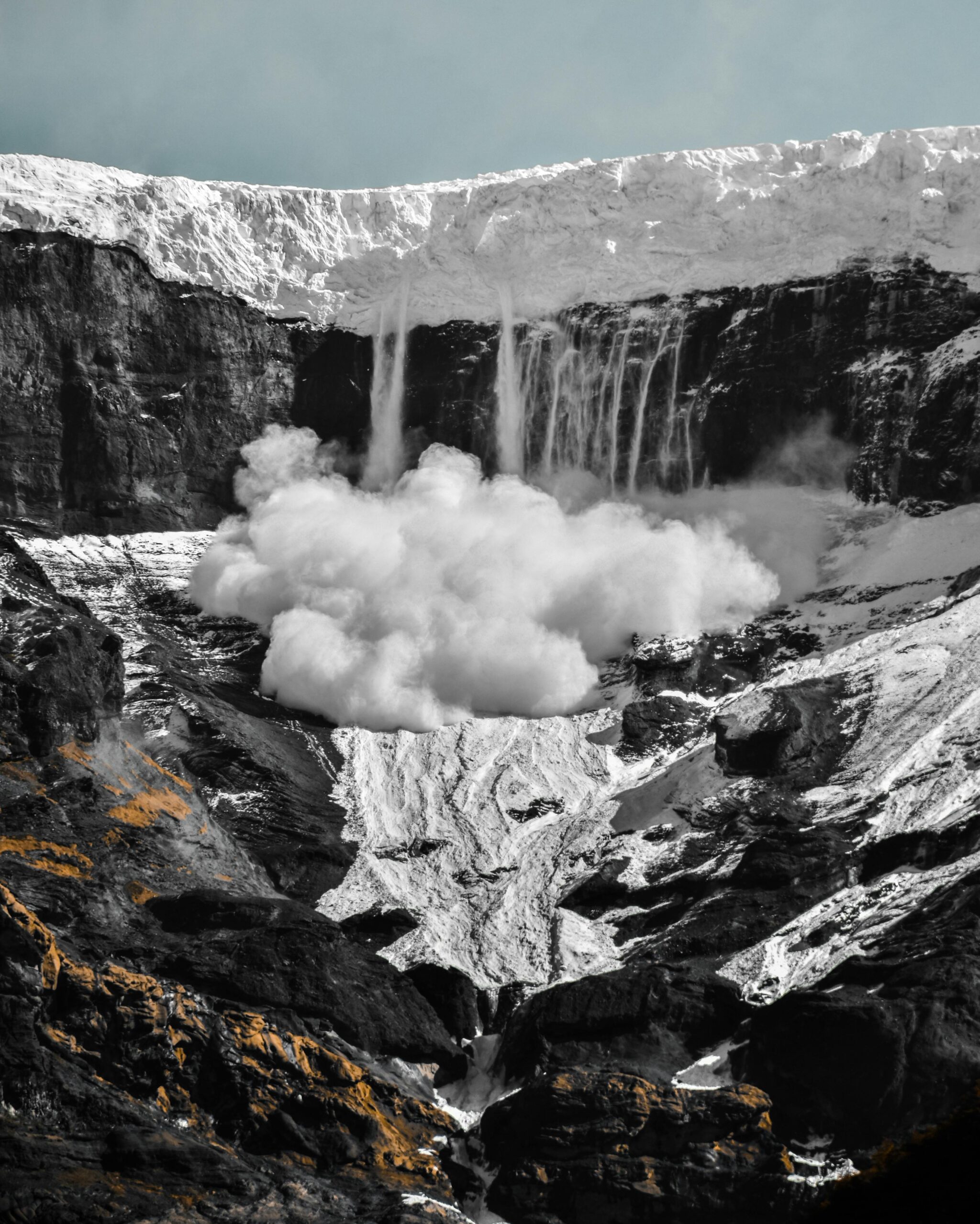 Captivating view of a snow avalanche cascading down Cerro Tronador in Patagonia.